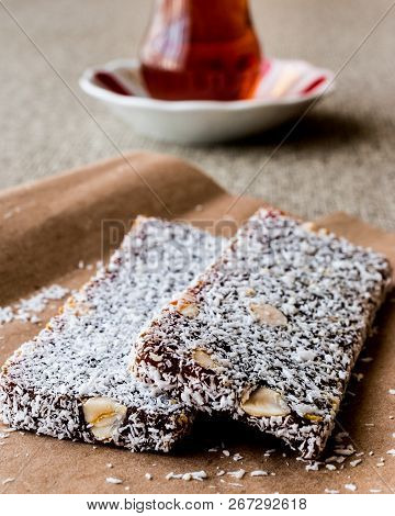 Turkish Dessert Cezerye With Walnut, Coconut Powder And Tea