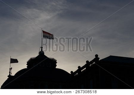 Dutch Flag On The Building In Hague, High Contrast Against Sky