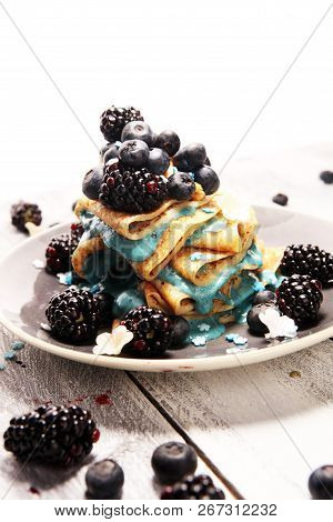 Delicious Tasty Homemade Crepes Or Pancakes With Blackberries,blueberries And Blue Spirulina Nicecre