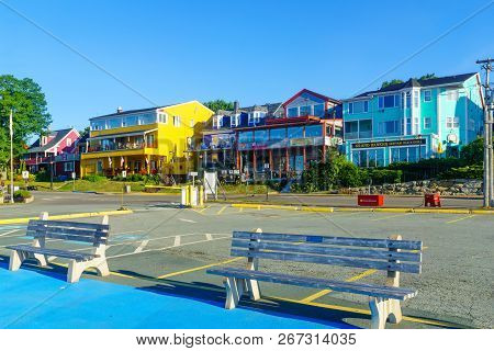 Lunenburg, Canada - September 21, 2018: Historic Houses In Bluenose Drive, With Tourists, In Lunenbu