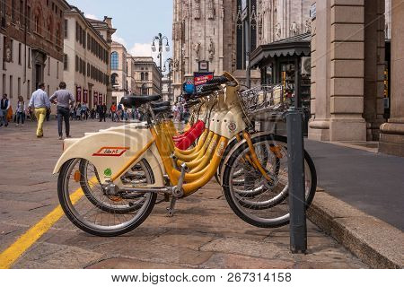 Milan, Italy - 09 May 2018: Yellow Bikemi Bicycles For Rent In A Parking Spot