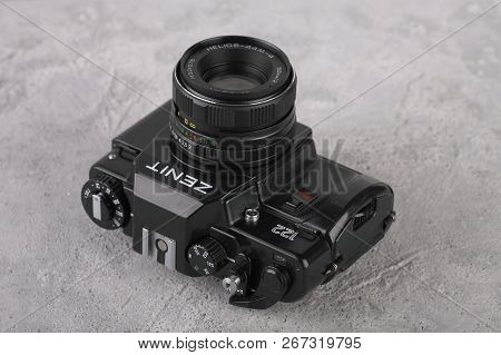 Moscow, Russia, May 14, 2017. The Old Soviet 35 Mm Slr Camera Zenit 122, Released 1997, On Cement Ba