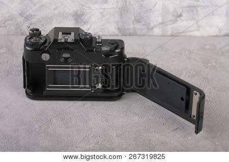 Moscow, Russia, May 14, 2017. The Old Soviet 35 Mm Slr Camera Zenit 122, Released 1997, On Cement Ba