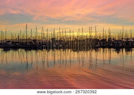 Sunset And Reflections On Emeryville Marina. Alameda County, California, Usa.