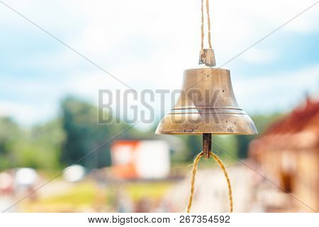 The Bell Hangs On A Rope Against The Sky