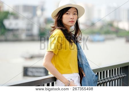 Young Asian Woman Portrait Smiling With Happiness At City Outdoors Background, Casual Lifesyle, Trav