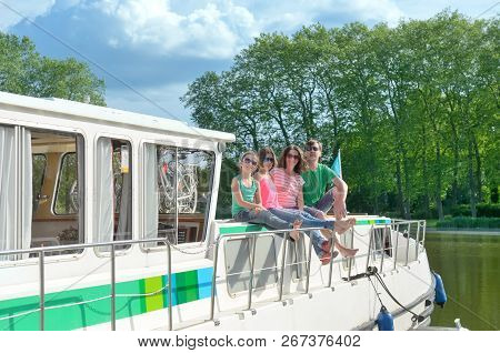 Family Vacation, Summer Holiday Travel On Barge Boat In Canal, Happy Kids And Parents Having Fun On 