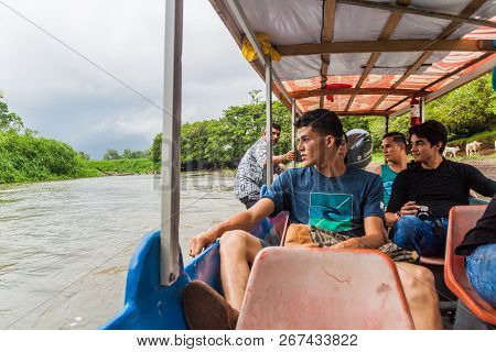 La Suerte, Costa Rica - May 14, 2016: Passengers Of A Boat Traveling From La Pavona To Tortuguero On