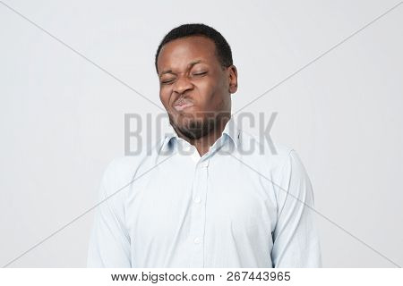 Disgusted Young African American Male Looking In Contempt, Feeling Loathing And Disgust