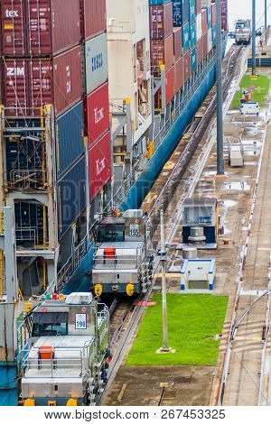Gatun, Panama - May 29, 2016: Container Ship Seaspan Efficiency Is  Passing Through Gatun Locks, Par