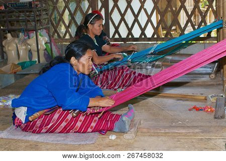 Doi Inthanon, Thailand - November 14, 2008: Unidentified Women Of The White Karen Hill Tribe Weaving