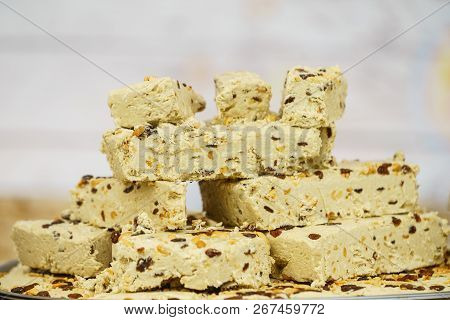 Halvah Sweet Traditional Food Dessert Made Of Nuts. Delicious Food, Tasty Healthy Snacks Concept.