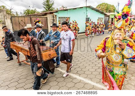 Parramos, Guatemala - December 28, 2016: Traditional Folk Dancers In Mask & Costume Perform Dance Of