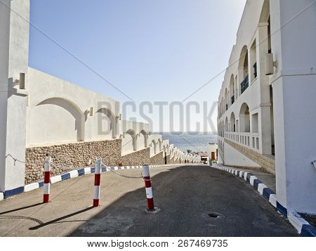 Egypt: Eastern Architecture - Buildings With Arches. Road Going Down To The Sea.