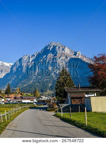 Landscape With Mountain Village In Autumn
