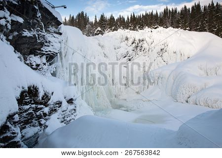 frozen waterfall Tannforsen in winter, Sweden
