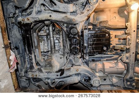 View Of The Car From Below. Autoservice Center. Car Maintenance
