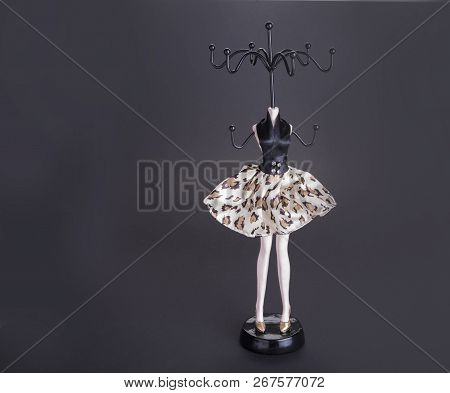 Mannequin As A Rack With Long Legs And Skirt On The Stand