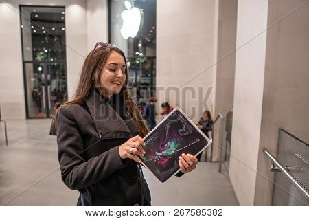 Barcelona, Spain - November 07, 2018: Woman Holding A New Ipad Pro