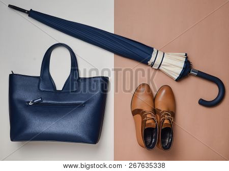 Autumn Collection Of Women's Accessories And Shoes. Demi-season Boots, An Umbrella, A Leather Bag On