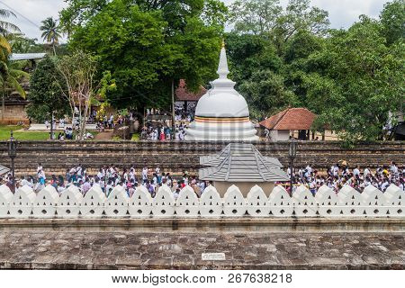 Kandy, Sri Lanka - July 19, 2016: White Clothed Buddhist Devotees At The Temple Of Sacred Tooth Reli