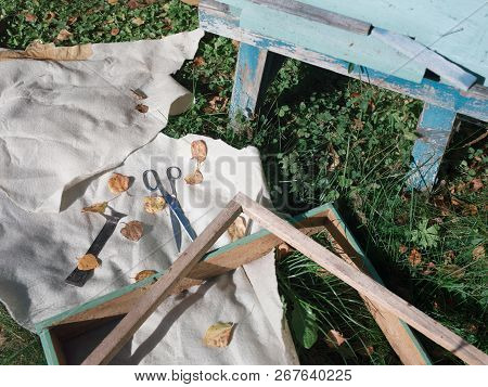 Abstract Crafsmanship In A Summertime Garden Next To The Beehive