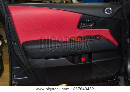 Interior Of The Suv Car With A Rebuilt Leather In Red-black Color In Exchange For The Old Worn-out I