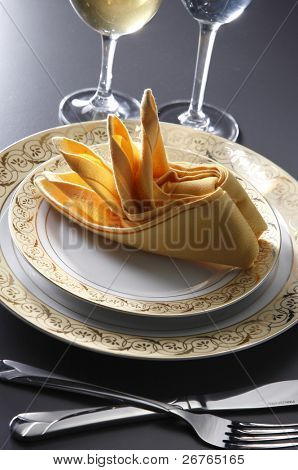 table setting for fine dining or party. cutlery and plate set up for wedding celebration