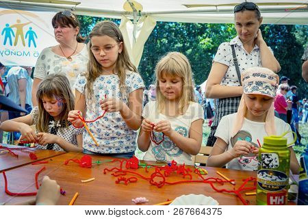 Zaporozhia/ukraine- June 2, 2018:charity Family Festival - Small Girls Participating At Art And Craf