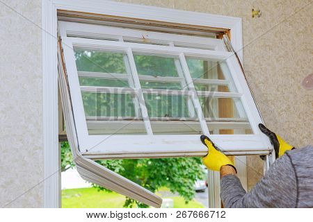 Home Repairs, Replacement Windows. Master Removes Old Window