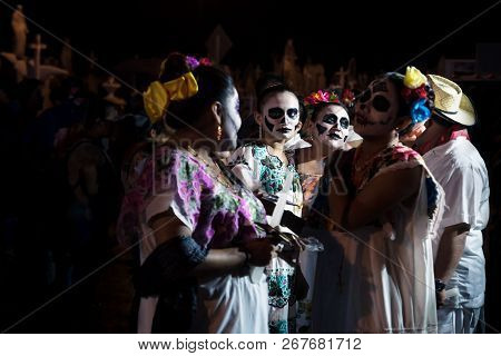 Merida, Cementerio General, Mexico - 31 October 2018: Costumed Group Of Visitors With 4 Women Dresse