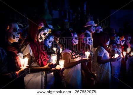 Merida, Cementerio General, Mexico - 31 October 2018: Line Of Customed Women Dressed As Catrinas Wit