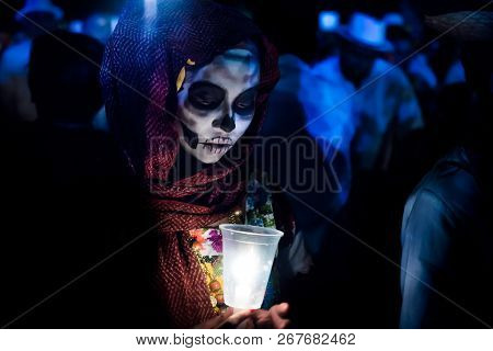 Merida, Cementerio General, Mexico - 31 October 2018: Close Up Of Costumed Woman With Red Scarve Ove