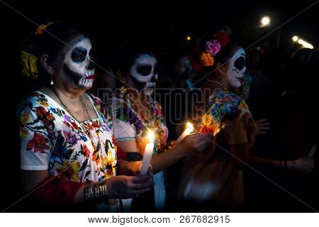 Merida, Cementerio General, Mexico - 31 October 2018: Three Customed Woman Dressed As Catrinas With 