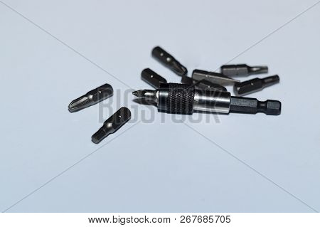 Many Tool Bits With Bitholder On White Background.