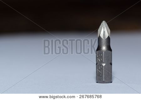 One Powerful Tool Bit On Blurred Background.