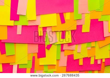 Bright Multi-colored Stickers On The Office White Board.