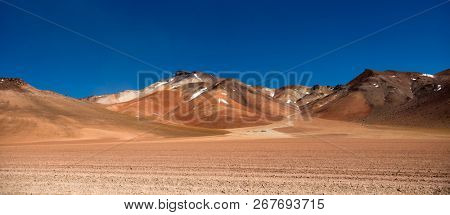 Panoramic view of wide sunshine mountanious Bolivian desert