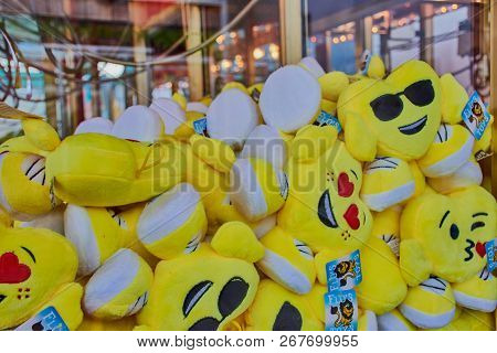 Mainz, Germany - August 31, 2018: Toy Crane On A German Funfair With Smilie Soft Toys In It