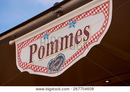 Sign With The Word Pommes Which Means Chips In English And Enjoy Your Meal In German