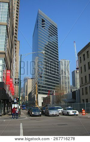Chicago - April 21: Skyscrapers, Tourists And Traffic Make Up A Street Scene On April 21, 2008 In Ch