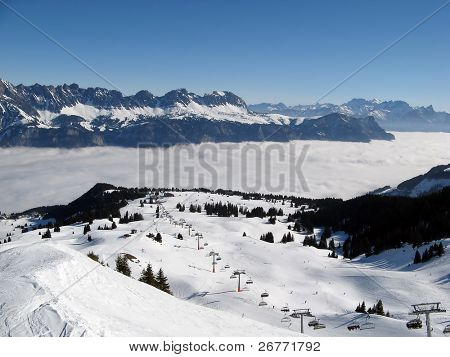 Lyžování nad mraky v Flumserberg (St. Gallen, Švýcarsko)