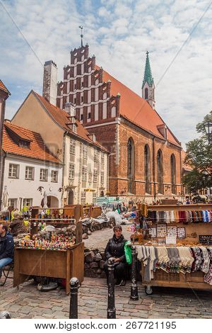 Riga, Latvia - August 19, 2016: View Of Skarnu Iela Street And St Johns Church In The Center Of Riga