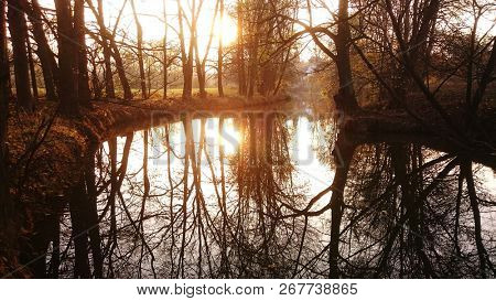 Evening atmosphere on the Radbuza river. Western Bohemia, Czech Republic. Sunset landscape wallpaper with 16 : 9 ratio.
