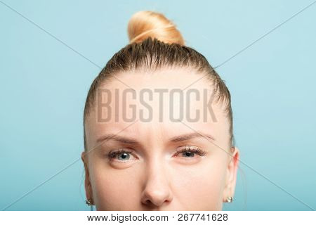 Quizzical Suspicious Thoughtful Woman With Inquisitive Look. Facial Portrait.