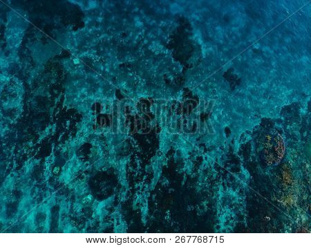 Turquoise Ocean Water With Coral Reef, Aerial Drone Shot. Top View