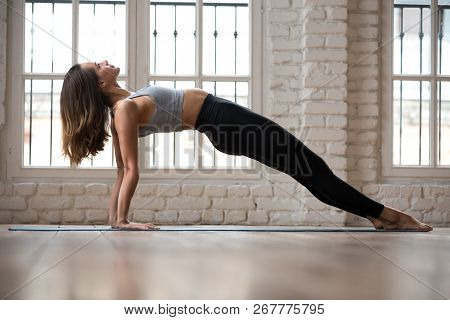 Young Attractive Woman Practicing Yoga, Doing Purvottanasana Exe