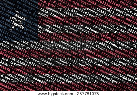 Liberia Flag  Is Depicted On The Screen With The Program Code. The Concept Of Modern Technology And 