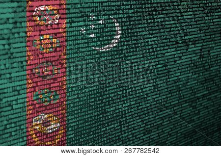 Turkmenistan Flag  Is Depicted On The Screen With The Program Code. The Concept Of Modern Technology