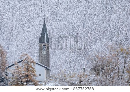 Church With Bell Covered In Snow, Bessans, France 2018.